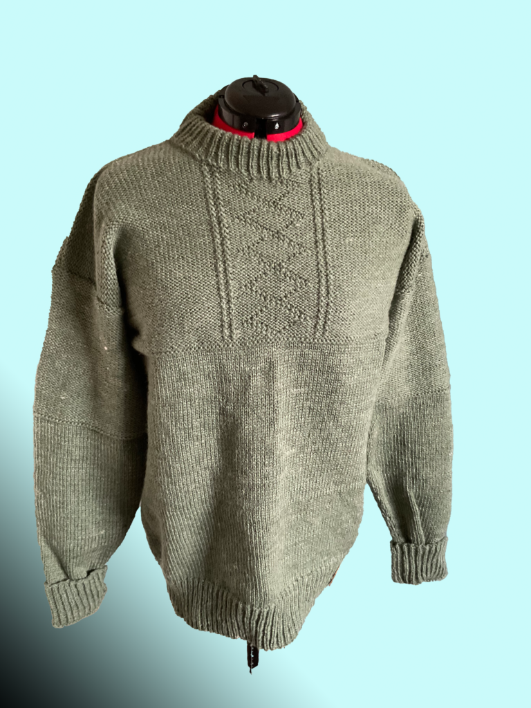 Aran yarn knitted sweater with diamond pattern