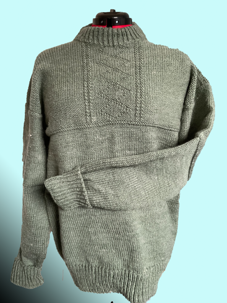 Aran yarn knitted sweater with diamond pattern