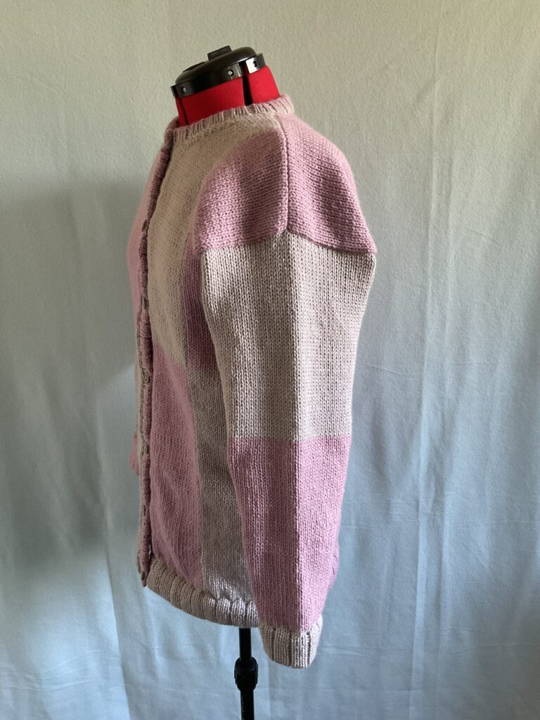 Side view of tow-tone knitted cardigan