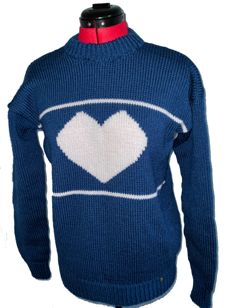 Classic navy and white ladies hand knit sweater.  Heart motif in white